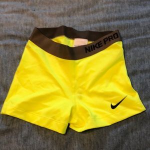 Neon yellow Nike Pro spandex shorts